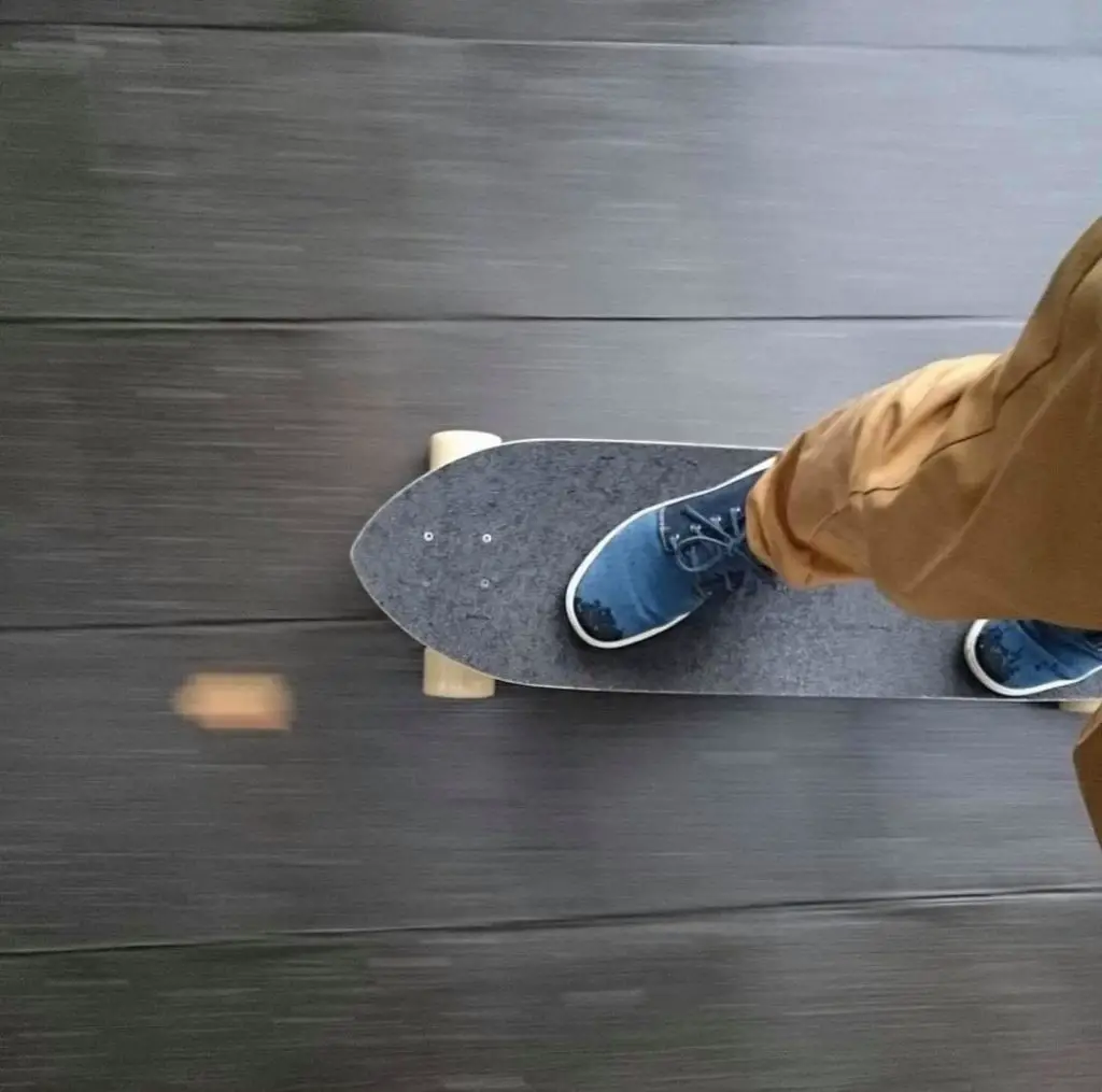 Electric Skateboard In The Rain